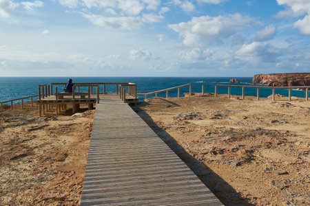 Wooden viewpoint on the edge of the Atlantic Ocean. Carrapateira coastline, Portugal.の写真素材