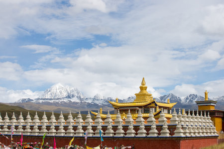 Golden temple with yala snow mountain