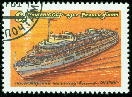 USSR - CIRCA 1981  A stamp printed in the USSR shows Passenger steam ship Cosmonaut Gagarin, circa 1971のeditorial素材