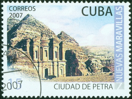 CUBA - CIRCA 2007  A stamp printed in cuba dedicated to new wonders, shows the city of Petra, circa 2007の写真素材