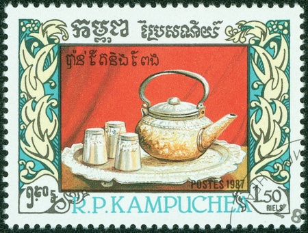 CAMBODIA- CIRCA 1987  A stamp printed in Cambodia, shows cup and saucer, jugs, circa 1987の写真素材