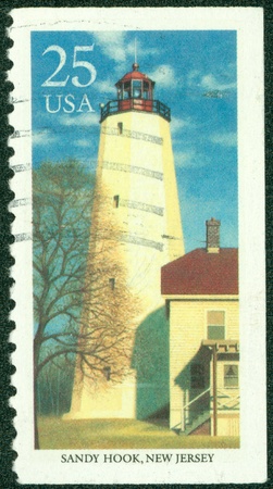 USA - CIRCA 1990  A Stamp printed in USA shows Sandy Hook Lighthouse, New Jersey, Lighthouses series, circa 1990のeditorial素材