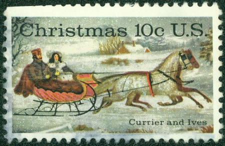 USA - CIRCA 1974  A stamp printed in USA shows  The Road-Winter  by Currier   Ives, circa 1974のeditorial素材