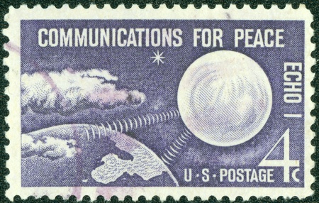 USA - CIRCA 1960  A stamp printed in the USA shows Echo I Communications for Peace, circa 1960のeditorial素材