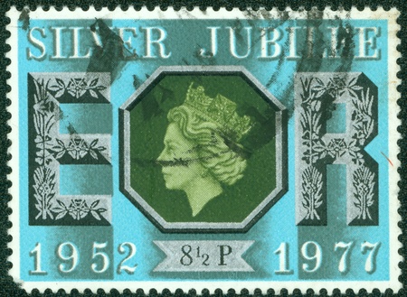 GREAT BRITAIN CIRCA 1977  a stamp printed in the Great Britain shows Queen Elizabeth II, 25th anniversary of the reign of Elizabeth II, circa 1977のeditorial素材