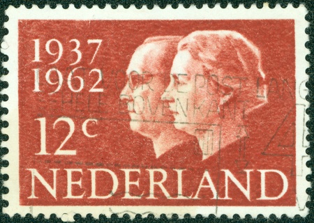 NETHERLANDS - CIRCA 1962  A stamp printed in the Netherlands, is dedicated to the 25th anniversary of the wedding, Queen Juliana and Prince Bernhard, circa 1962のeditorial素材