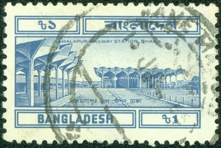 BANGLADESH - CIRCA 1994  A stamp printed in Bangladesh shows Kamalapur Railway Station in Dhaka, circa 1994の写真素材