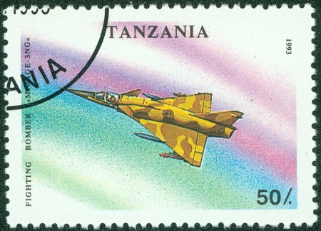 TANZANIA - CIRCA 1993  A stamp printed in Tanzania showing fighter plane, circa 1993のeditorial素材