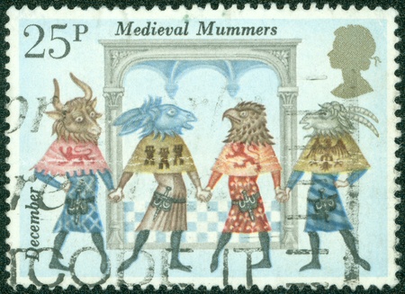 UNITED KINGDOM - CIRCA 1988  A stamp printed in Great Britain shows medieval mummers,circa 1988のeditorial素材