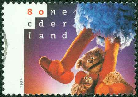 HOLLAND - CIRCA 1996  A stamp printed in Netherlands shows Tommie, Ieniemienie and Pino  legs only , circa 1996のeditorial素材
