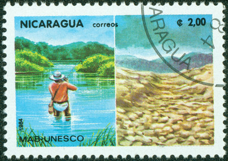 NICARAGUA - CIRCA 1984  A stamp printed in Nicaragua shows Environmental damage, circa 1984のeditorial素材