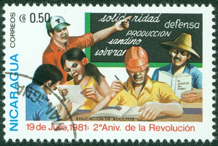 NICARAGUA - CIRCA 1981  A stamp printed in Nicaragua shows adult education, circa 1981のeditorial素材