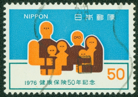 JAPAN - CIRCA 1976  A stamp printed in japan shows Family, circa 1976のeditorial素材