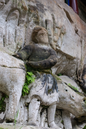 DAZU TOWN CHONGQING CHINA - NOVEMBER 23,2012   Ancient Buddhist Hillside Rock Carvings, Ten Austerities of Liu Benzun - November 23,2012 at Baodingshan temple in Dazu town, Chongqing, Chinaのeditorial素材