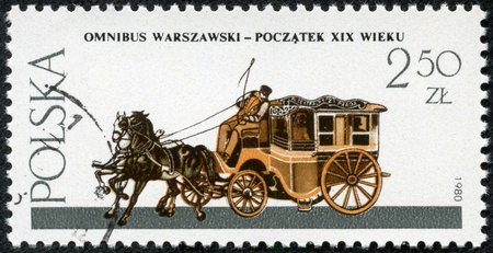 POLAND - CIRCA 1980  A stamp printed in Poland shows a carriage with a horse, circa 1980 のeditorial素材