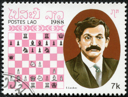LAOS - CIRCA 1988  A stamp printed in Laos, shows E lasker, Chess Champion, circa 1988のeditorial素材