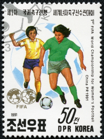 KOREA - CIRCA 1991  a stamp printed in North Korea Shows the Soccer Players with Inscription  1st fifia world championship for Women s football,china 1991 , circa 1991のeditorial素材