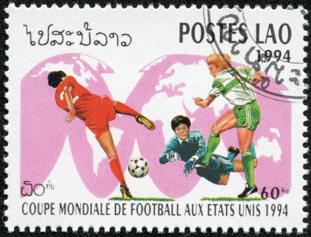 LAOS - CIRCA 1994  stamp printed by Laos, shows football, circa 1994 のeditorial素材