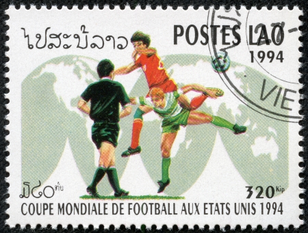 LAOS - CIRCA 1994  stamp printed by Laos, shows football, circa 1994 のeditorial素材