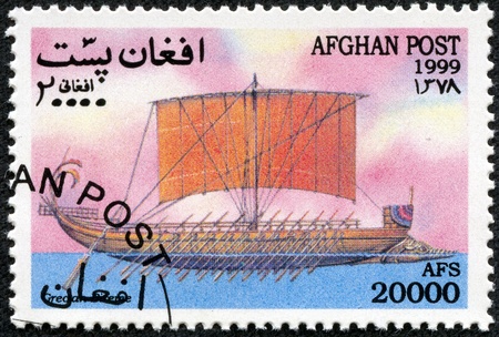 AFGHANISTAN - CIRCA 1999  A Stamp printed in Afghanistan shows sailboat, series, circa 1999の写真素材