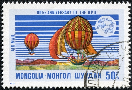 MONGOLIA - CIRCA 1974  A stamp printed by Mongolia, shows aerostat and UPU Emblem, circa 1974のeditorial素材