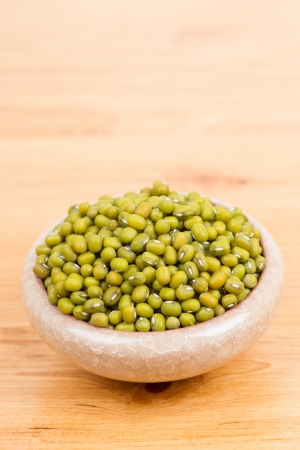 Green mung beans in bowlの写真素材
