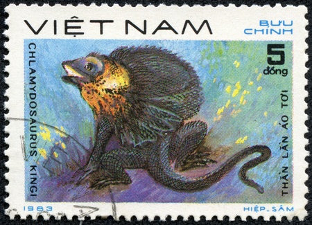 VIETNAM - CIRCA 1983  A stamp printed in VIETNAM shows a Frilled dragon - Chlamydosaurus kingi, series, circa 1983のeditorial素材