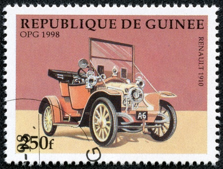 GUINEA - CIRCA 1998  A stamp printed in Guinea showing vintage car, circa 1998のeditorial素材