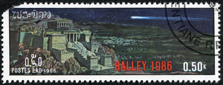 LAOS - CIRCA 1986  A stamp printed in Laos devoted comet Halley, circa 1986のeditorial素材