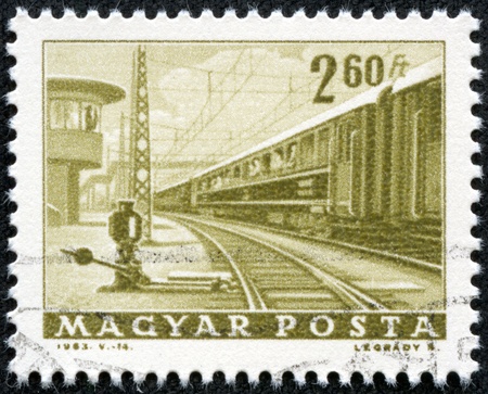 HUNGARY - CIRCA 1963  A stamp printed in the Hungary shows passenger train, circa 1963のeditorial素材