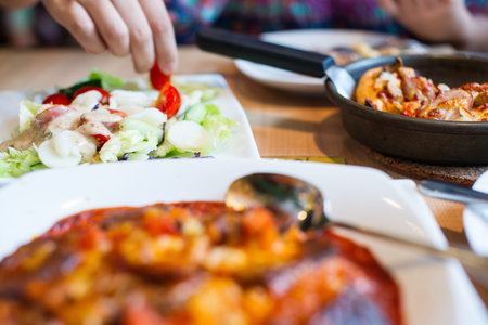food, plate and handの写真素材