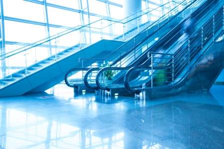 People rush on escalator motion blurredのeditorial素材