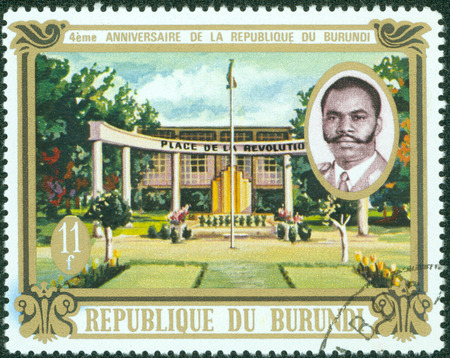 BURUNDI - CIRCA 1967  A stamp printed in Burundi shows Place de la Revolution and President Michel Micombero, with the inscription and name of series  1st anniversary of Burundi Republic , circa 1967のeditorial素材