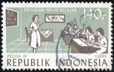 INDONESIA - CIRCA 1985  A stamp printed in the Indonesia, is dedicated to 4th Five Year Plan  Children in classroom, circa 1985のeditorial素材