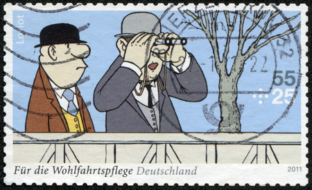 GERMANY - CIRCA 2011  A stamp printed in Germany shows a fragment of the Sketch comedy Loriot  Auf der Rennbahn , circa 2011のeditorial素材