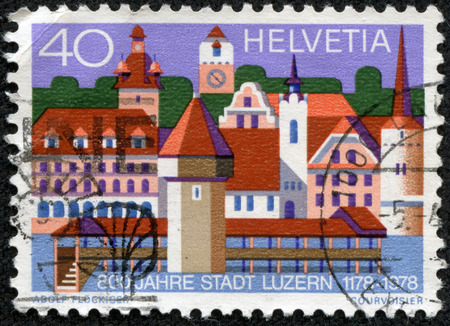 SWITZERLAND - CIRCA 1978  A stamp printed in Switzerland dedicated to the 800th anniversary of the town of Lucerne shows landmark builldings from the city, circa 1978 のeditorial素材