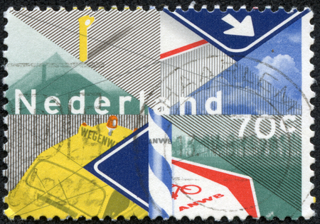 NETHERLANDS - CIRCA 1983  A stamp printed in Netherlands honoring Centenary of Royal Dutch Touring Club, Touring Club Activities , circa 1983のeditorial素材