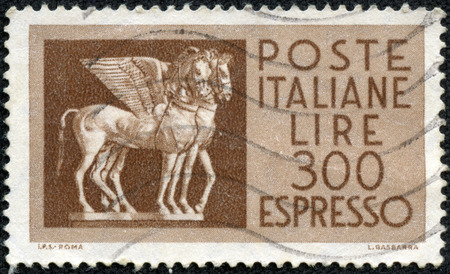ITALY - CIRCA 1958  A stamp printed in Italy shows Etruscan Winged Horses, with inscription and name of series  Espresso  ; ;, circa 1958のeditorial素材