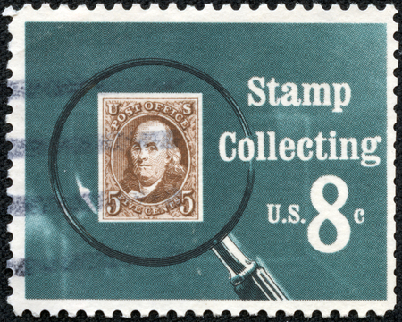 UNITED STATES OF AMERICA - CIRCA 1972  A stamp printed in USA shows Pictures magnifying glass over United States postage stamp, circa 1972のeditorial素材
