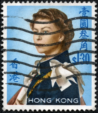 HONG KONG - CIRCA 1962  stamp printed by Hong Kong, shows portait of Queen Elizabeth II by Pietro Annigoni , circa 1962のeditorial素材