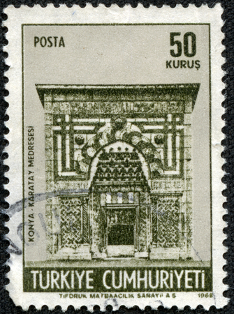 TURKEY - CIRCA 1968: A stamp printed by Turkey, shows Karatay Medresse, University Gate, Konya, circa 1968のeditorial素材