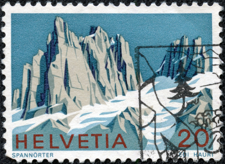 SWITZERLAND - CIRCA 1972  a stamp printed in Switzerland shows View of Spannorter, Swiss Alps, circa 1972の写真素材