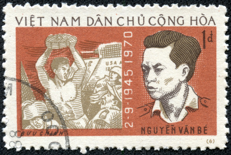 VIETNAM - CIRCA 1970  A stamp printed in Vietnam shows Vietnamese people, circa 1970のeditorial素材