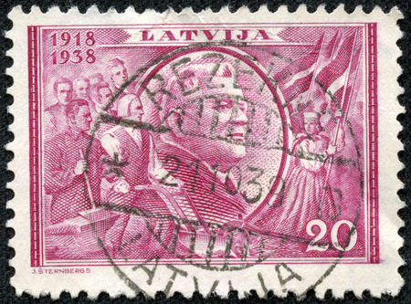 LATVIA - CIRCA 1938  stamp printed by Latvia, shows President Karlis Ulmanis, circa 1938のeditorial素材
