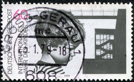 GERMANY - CIRCA 1979  a stamp printed in the Germany shows Child and Building, International Year of the Child and 20th Anniversary of Declaration of Children s Rights, circa 1979のeditorial素材