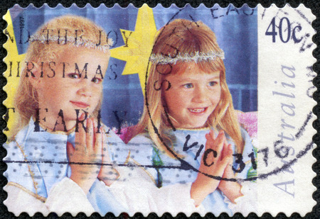 AUSTRALIA - CIRCA 1997  A Stamp printed in AUSTRALIA shows the Children in Christmas Nativity pageant,  Angels , Christmas series, circa 1997のeditorial素材