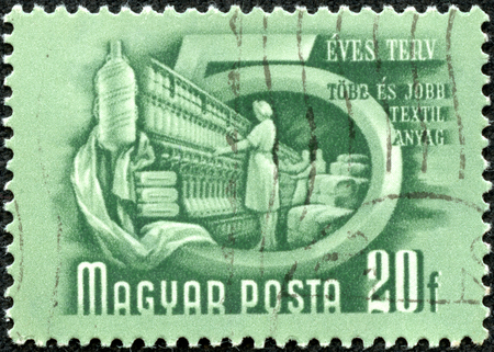 HUNGARY - CIRCA 1950   A stamp printed in Hungary shows Textile industry with the inscription  Five-Year-Pla n , from the series  Hungary s Five-Year-Plan  ; ;, circa 1950のeditorial素材