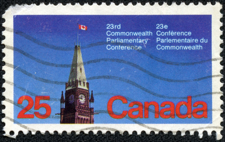 CANADA - CIRCA 1977  a stamp printed in the Canada shows Peace Tower, Parliament, Ottawa, 23rd Commonwealth Parliamentary Conference, Ottawa, circa 1977のeditorial素材