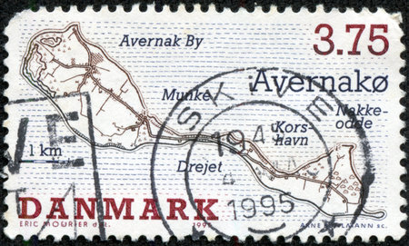 DENMARK - CIRCA 1995  a stamp printed in the Denmark shows Avernako, Danish Island, circa 1995の写真素材