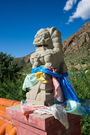Chinese stone lions with blue sky backgroundのeditorial素材